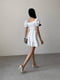 Сукня А-силуету молочного кольору з квітковим принтом | 6398530 | фото 3