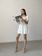 Сукня А-силуету молочного кольору з квітковим принтом | 6398530 | фото 7