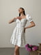 Сукня А-силуету молочного кольору з квітковим принтом | 6398531 | фото 7