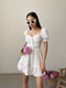 Платье А-силуэта молочного цвета с цветочным принтом | 6398532 | фото 2