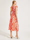 Сукня А-силуету помаранчева в принт | 6438127 | фото 2