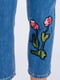 Зауженные джинсы с декоративной нашивкой | 6438580 | фото 4