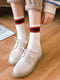 Шкарпетки молочного кольору зі смужками | 6499036 | фото 3