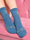 Шкарпетки синьо-зеленого кольору з візерунком | 6487895