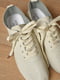 Мокасини бежевого кольору на шнурівці | 6495605 | фото 4