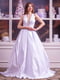 Біла весільна сукня з глибоким декольте і мереживом | 6506053 | фото 2