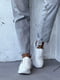 Лаконічні білі кросівки з натуральної шкіри | 6519367 | фото 9