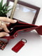 Подарунковий набір: шкіряний гаманець та брелок червоного кольору з логотипом бренду | 6528240 | фото 8