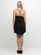 Сукня чорного кольору, декорована рюшами | 6543630 | фото 2