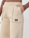 Трикотажные штаны кофейного цвета на флисе с накладными карманами | 6547819 | фото 4