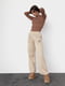 Трикотажные штаны кофейного цвета на флисе с накладными карманами | 6547819 | фото 6
