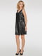 Коктейльное платье черного цвета выполнено из сетки, расшитой мелкими пайетками | 6547894 | фото 2