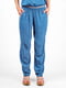 Легкие брюки голубого цвета в цветочный принт | 6548573 | фото 5