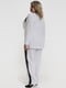 Елегантний білий костюм у діловому стилі з мереживними вставками | 6548727 | фото 2