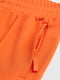 Оранжевые спортивные брюки с молниями по бокам | 6527889 | фото 3