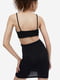 Приталена чорна сукня-міні з вирізами з боків | 6527935 | фото 4