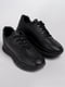 Сдержанные класические кроссовки черного цвета | 6570517 | фото 4