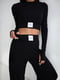 Черный легкий трикотажный костюм в рубчик с топом и брюками палаццо | 6570200 | фото 7