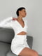 Сукня-жакет білого кольору з оригінальним вирізом та накладними кишенями | 6570296 | фото 3