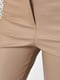 Вузькі укорочені бежеві штани з еко-шкіри | 6577212 | фото 4