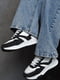 Кросівки чорно-білого кольору на шнурівці | 6577384 | фото 2
