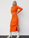 Оранжевый костюм в рубчик: джемпер и юбка | 6584297