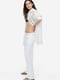 Штани вільного крою білого кольору із віскозно-лляної тканини зі складками спереду. | 6589914 | фото 5
