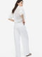 Штани вільного крою білого кольору із віскозно-лляної тканини зі складками спереду. | 6589914 | фото 6