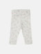 Штани для дівчинки ніжно-бірюзового кольору в квітковий принт | 6585287 | фото 2