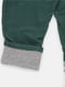Зеленые брюки с декоративными пуговицами и шнурком | 6608481 | фото 4