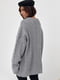 В'язаний светр оверсайз сірого кольору з візерунками із кісок | 6615908 | фото 3