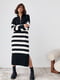 Вязаное платье-свитер черного цвета в полоску фасона oversize | 6616637 | фото 4