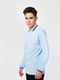 Голубая футболка-поло с длинными рукавами и контрастными полосами на воротнике и манжетах | 6618230 | фото 3