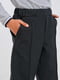 Зауженные брюки черно-серого цвета в клетку с декоративными стрелками | 6618562 | фото 2