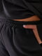 Теплий спортивний костюм-двійка чорно-пудрового кольору: худі та джогери | 6628397 | фото 3
