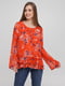 Блуза помаранчева з квітковим принтом та оборками | 5852345