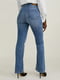 Голубые джинсы-клеш с потертостями | 6631278 | фото 3