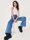 Широкие джинсы классического синего цвета | 6631680 | фото 3