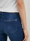 Укороченные джинсы-клеш синего цвета | 6631979 | фото 5