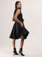 Черное А-силуэтное платье с объемным декоративным бантом | 6652860 | фото 4