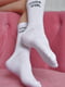 Шкарпетки високі білого кольору з написом | 6685721 | фото 2