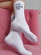Шкарпетки білого кольору з написом | 6685727 | фото 2