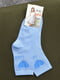 Шкарпетки блакитного кольору з малюнком | 6685823