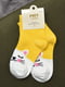 Шкарпетки жовтого кольору | 6685855