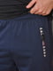 Спортивні штани темно-синього кольору зі смужками з боків | 6686774 | фото 4