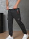Спортивные черные штаны с накладными карманами | 6686775 | фото 2