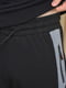 Спортивные штаны на флисе черного цвета | 6686788 | фото 4