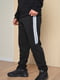 Спортивные штаны на флисе черного цвета | 6686790 | фото 2