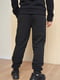 Спортивные штаны на флисе черного цвета | 6686793 | фото 3