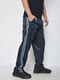Спортивные штаны темно-синего цвета с контрастными полосками | 6686798 | фото 2